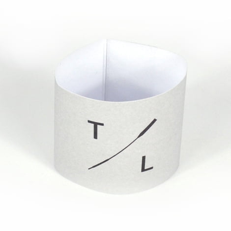Close up of printed napkin ring with company branding