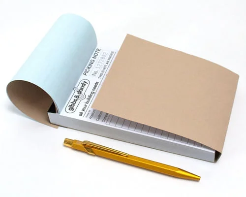 NCR-book-with-writing-sheild
