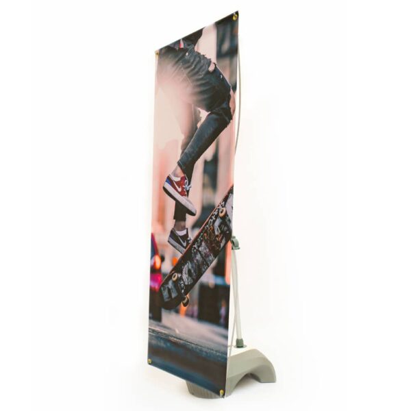an outdoor banner with a skateboard image